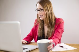 Woman achieving exam success.