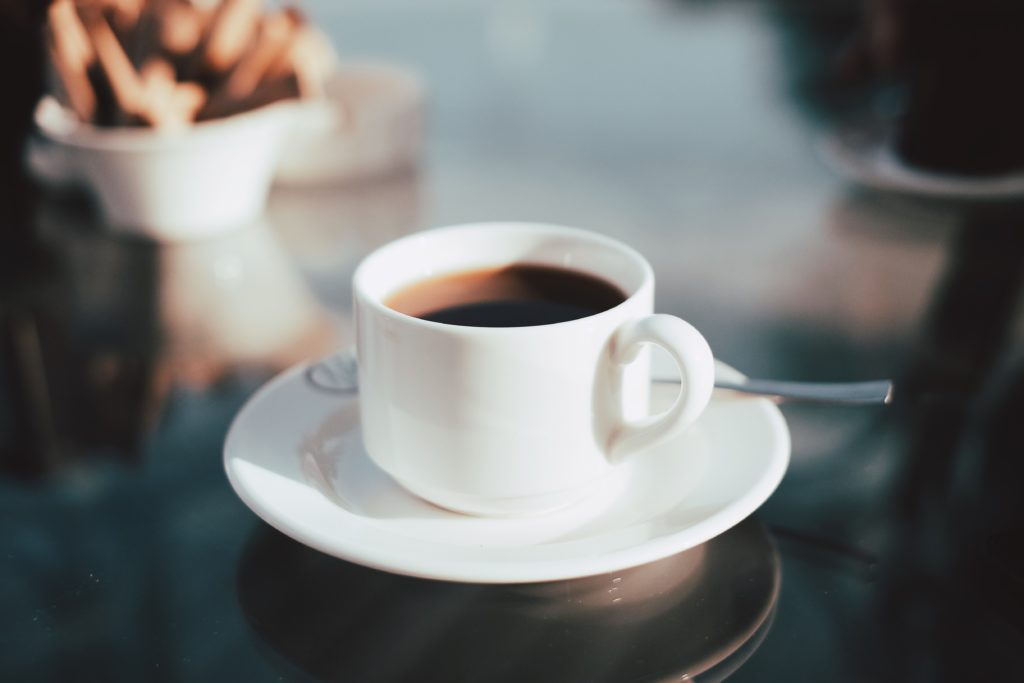 White coffee cup on saucer