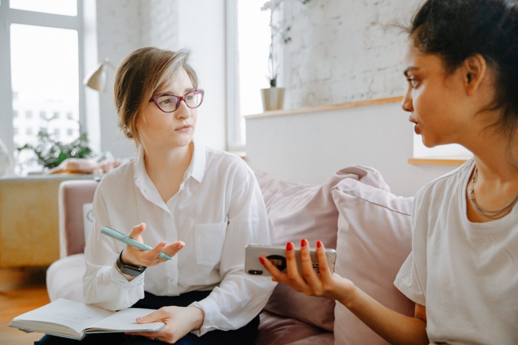 Two women communicating