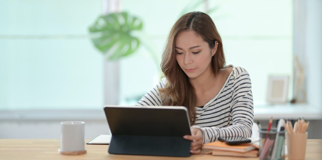 Woman preparing for Baby-Friendly Hospital Initiative questions.