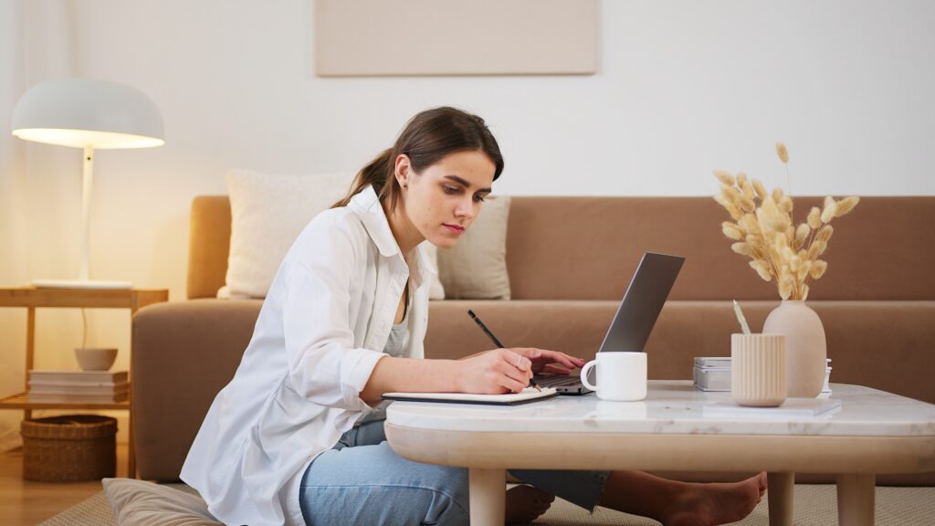 Woman on laptop studying to pass after failing