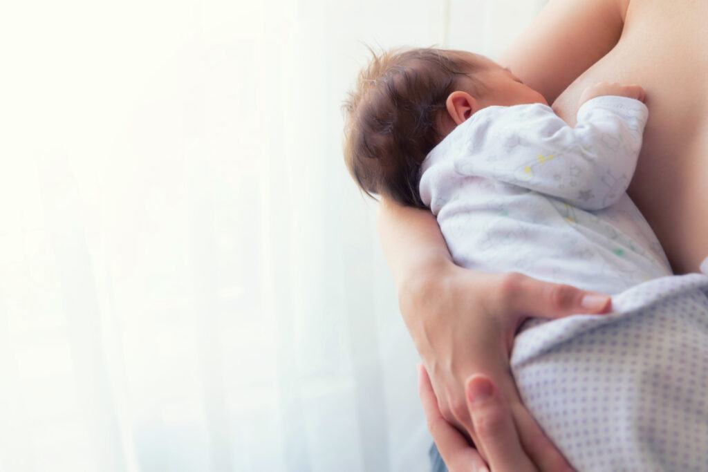 Newborn baby breastfeeding