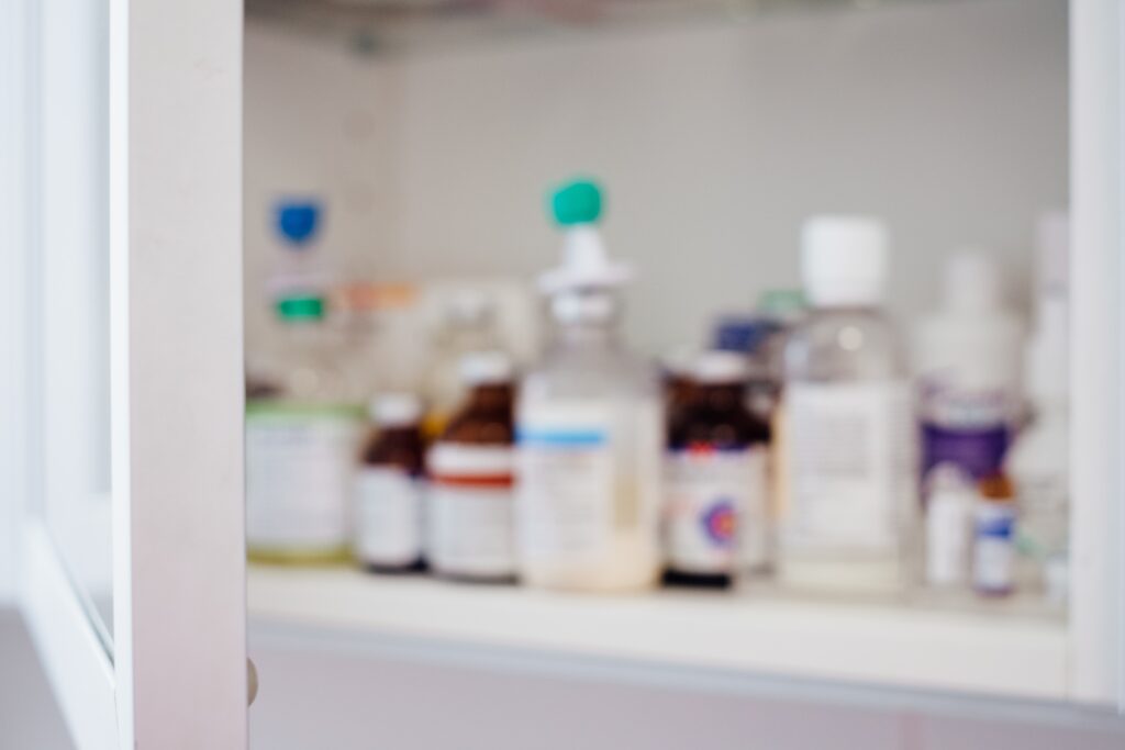 Medicine cabinet filled with pharmaceuticals.