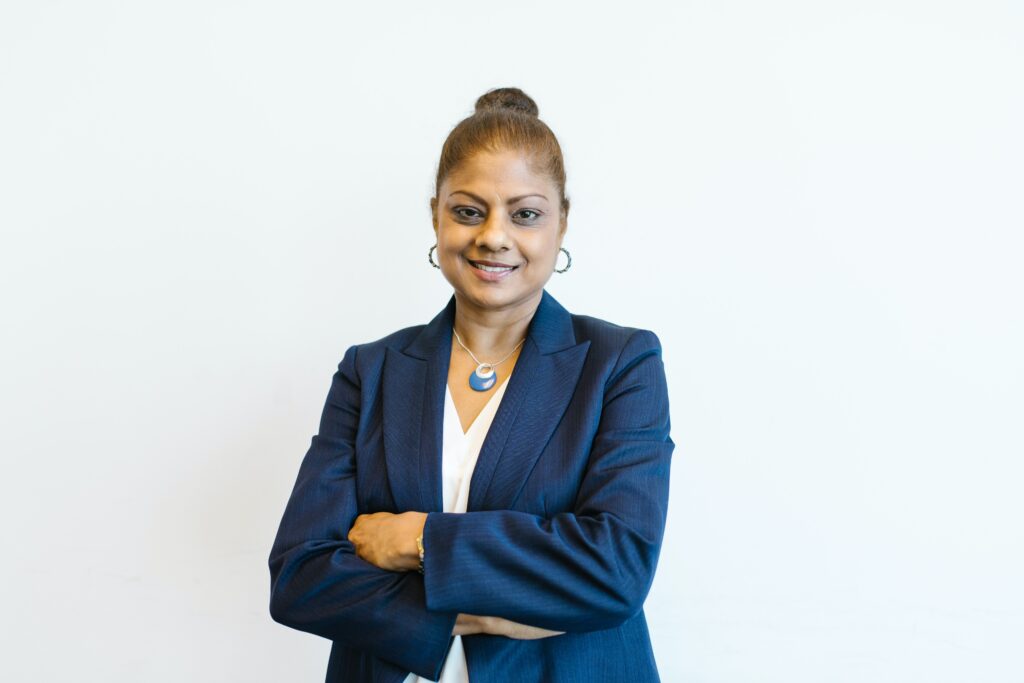 Woman in blue blazer.