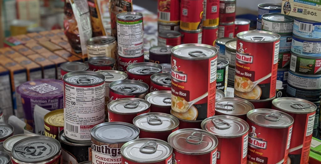Canned goods and donations at a food bank.